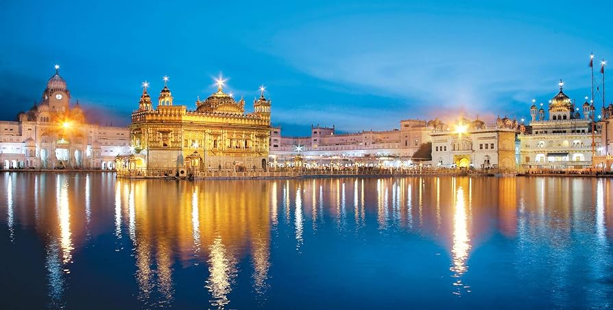 A gleaming sanctuary amidst tranquil waters The Golden Temple in all its splendor.